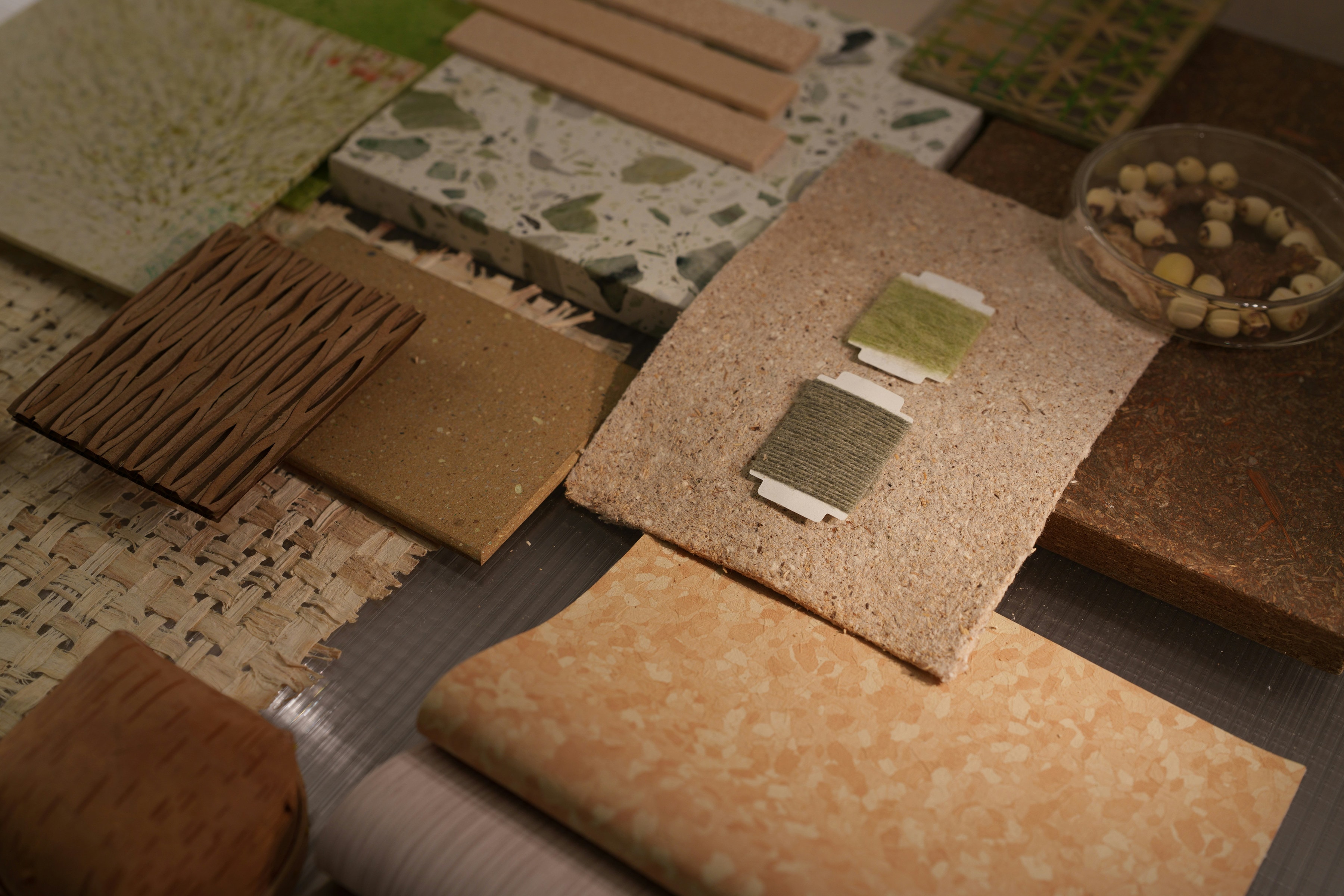 Interior material sample board with terrazzo, cork and textured wood